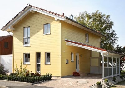 Schwedenhaus, gelbe Holzverkleidung