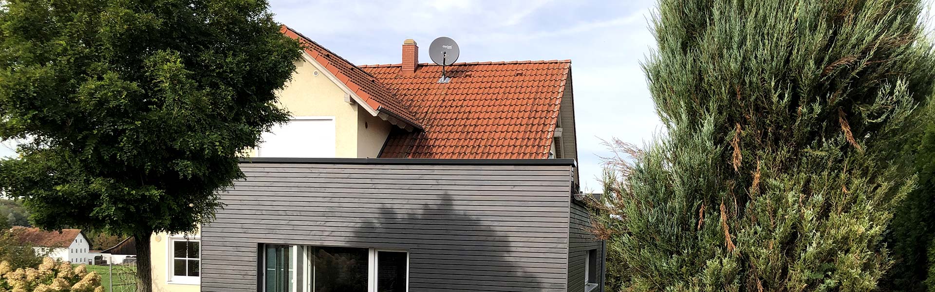 Anbau an ein Einfamilenhaus Anbau an ein Einfamilenhaus
